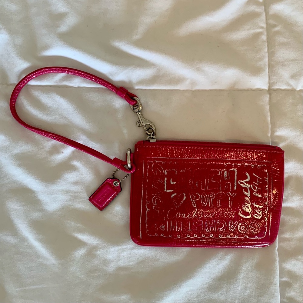 Coach hot pink patent leather wristlet